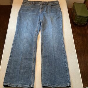 Liz Claiborne, slim bootcut, Women’s size 12, blue jeans decorative pockets.
